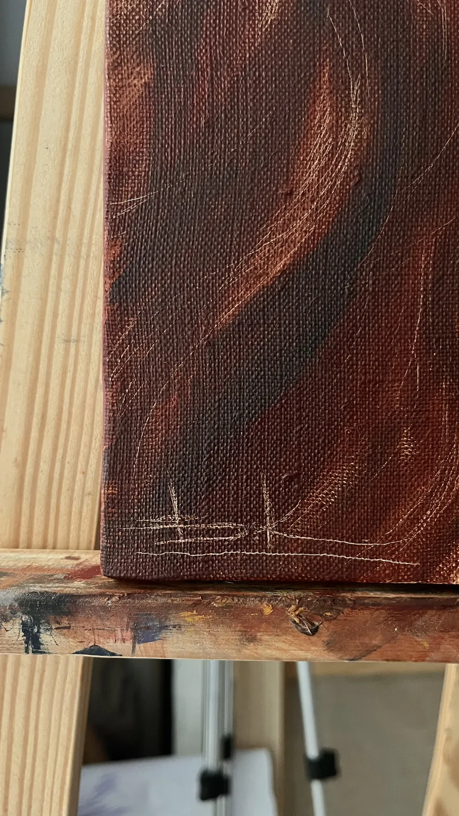 Detail: the artist's signature B.K. in the corner of the canvas