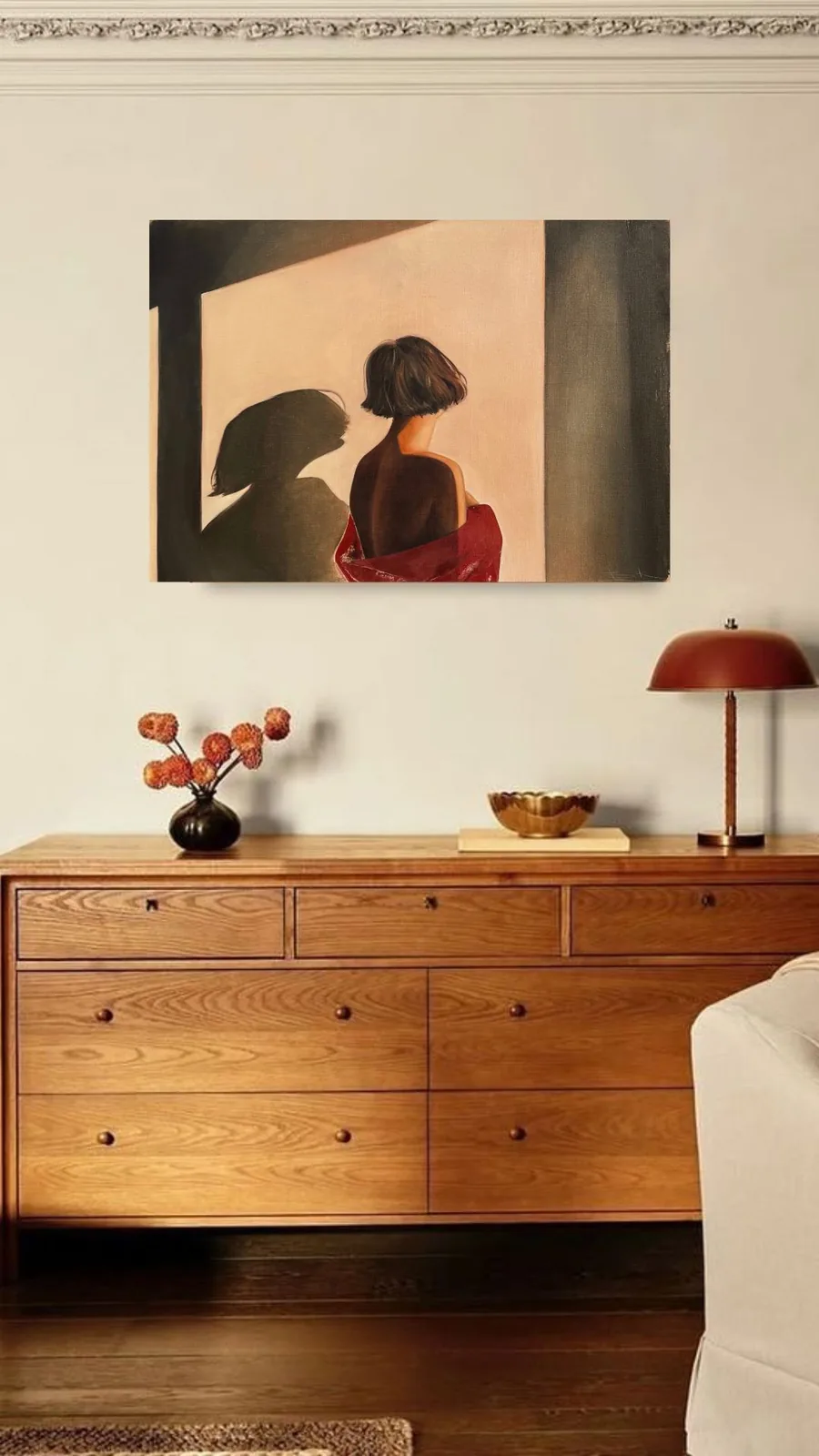 Visualisation above a wooden chest of drawers
